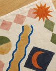 Tischläufer in grafischem Boho-Stil, warme Töne